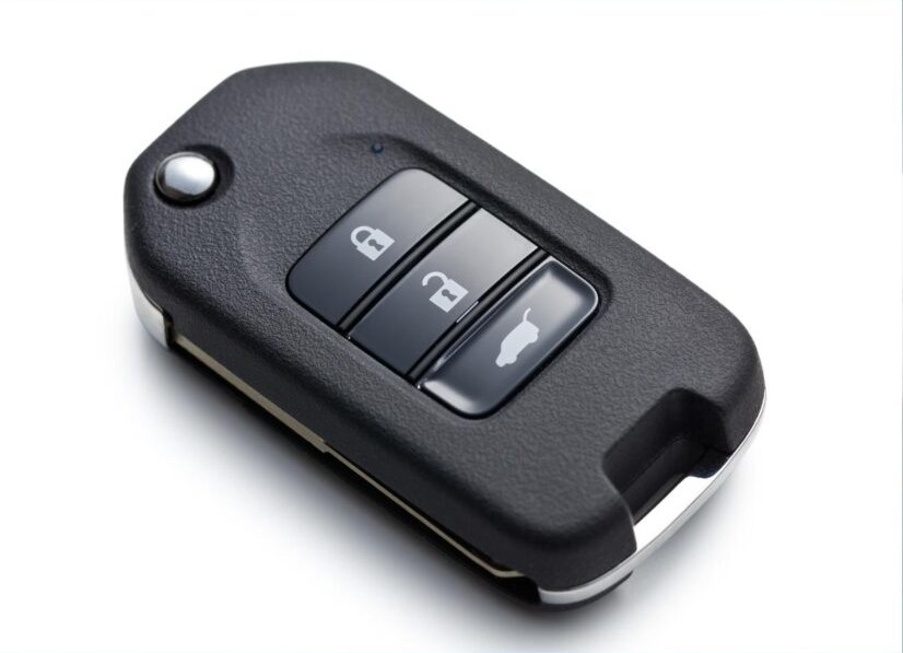Chave automotiva codificada do tipo canivete